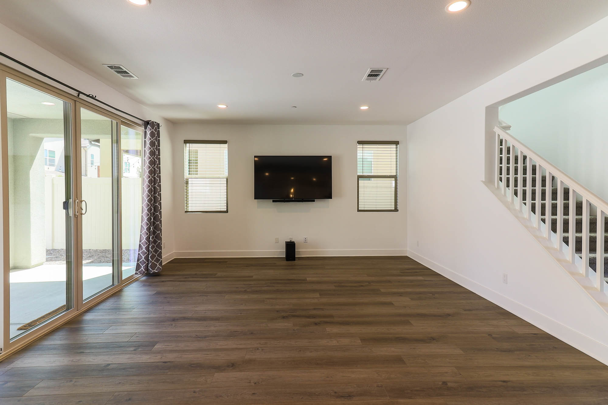 Family room photo with TV