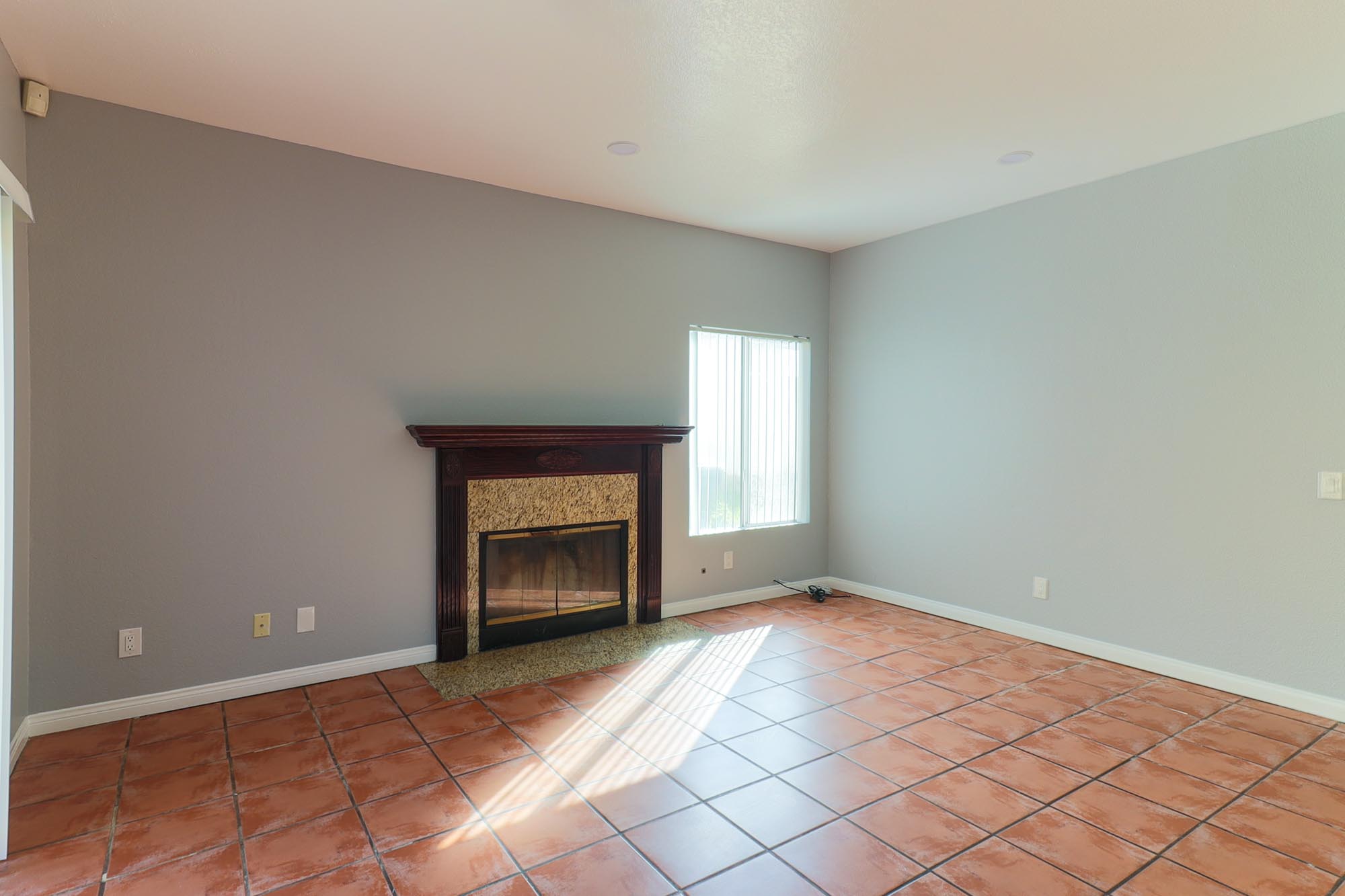 Village family room with fireplace photo