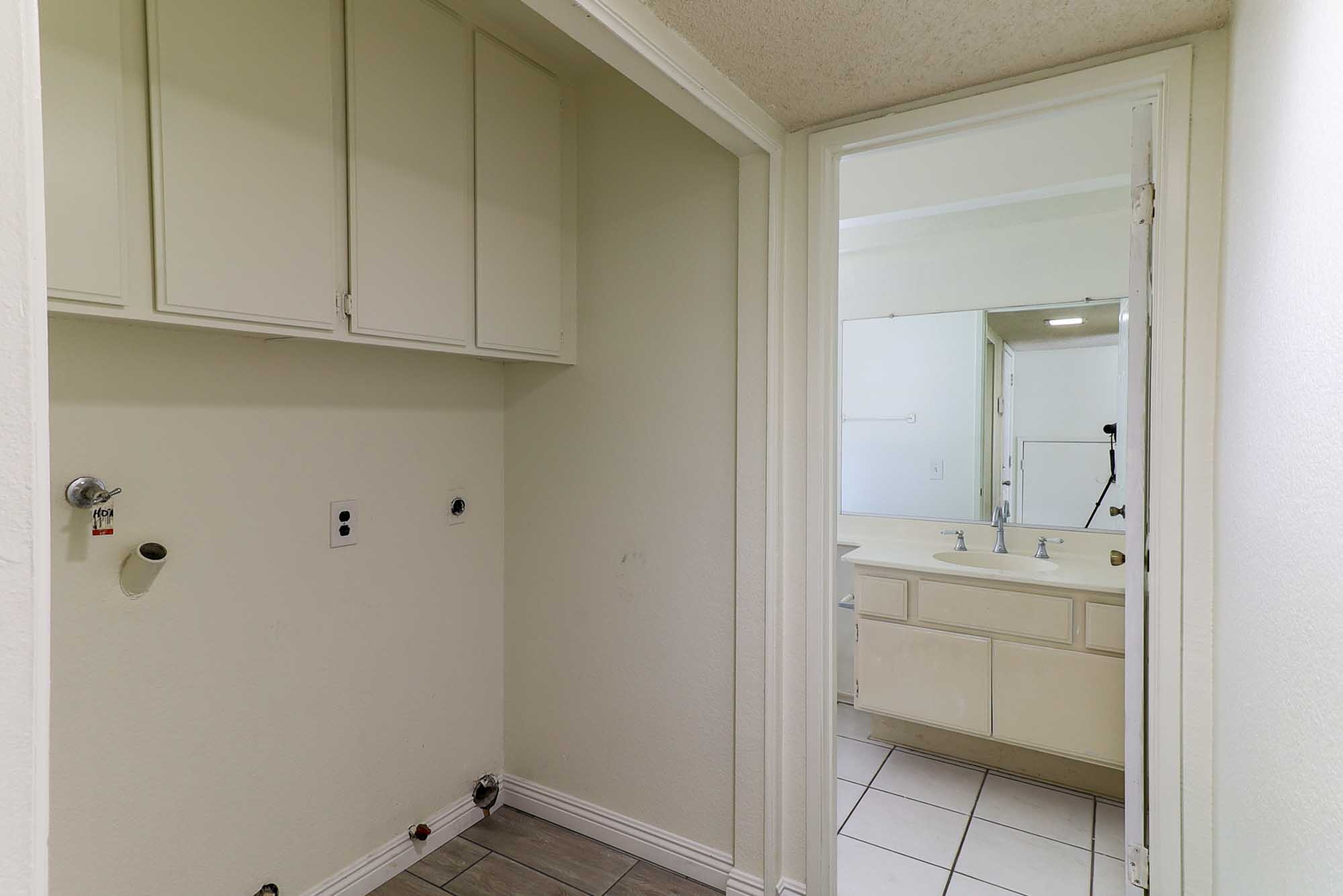 Ponce De Leon laundry room and downstairs bathroom photo