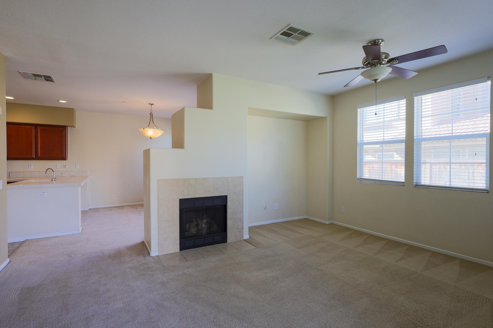 Wind Chime family room with fireplace photo