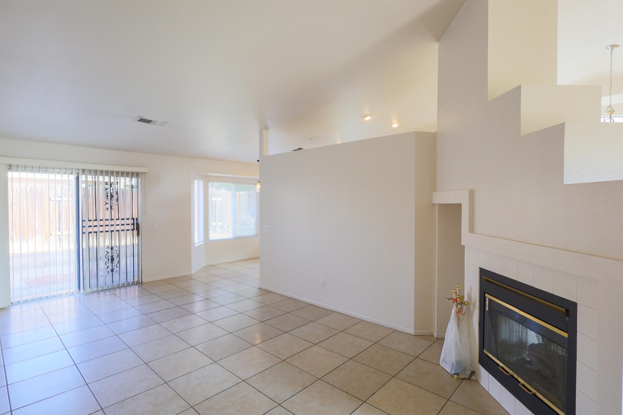 Superior family room photo with fireplace